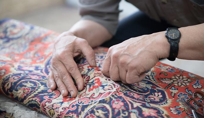 Rug repairing using equipment