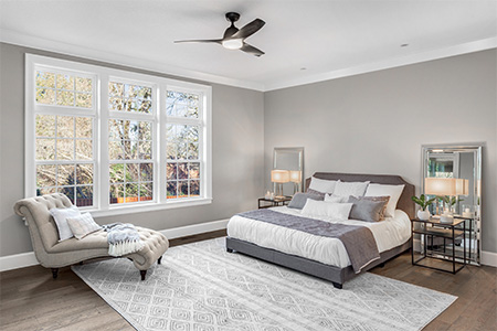 a beautiful white rug in a bedroom